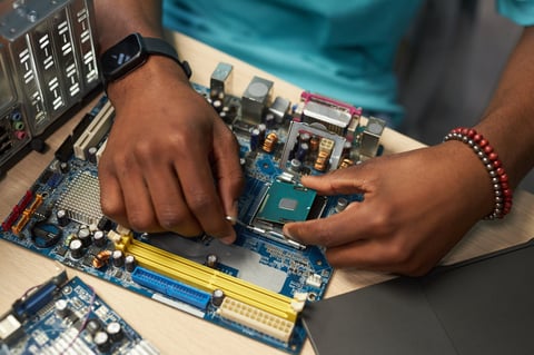 Repairman working with computer